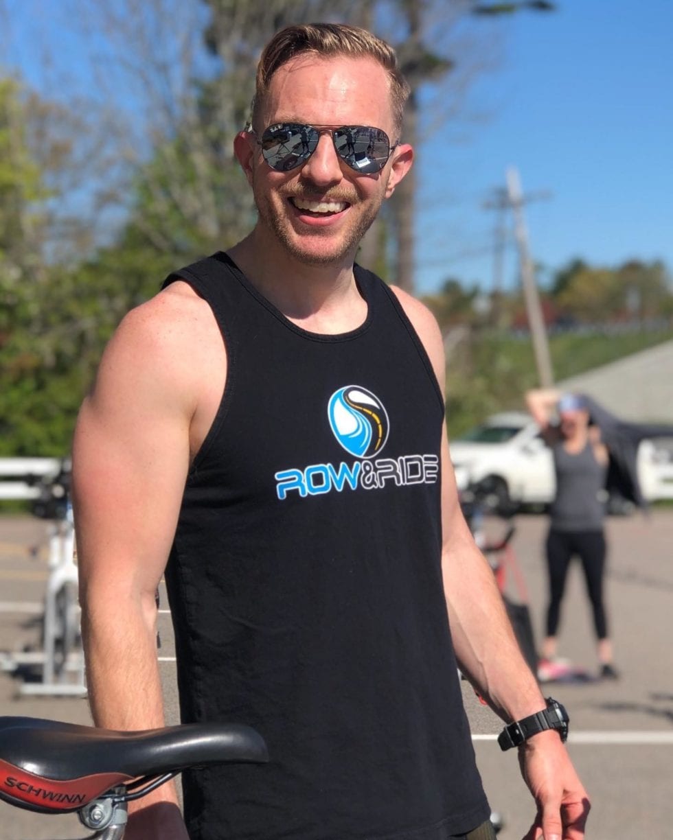 Man Athlete Wearing Row and Ride Merchandise